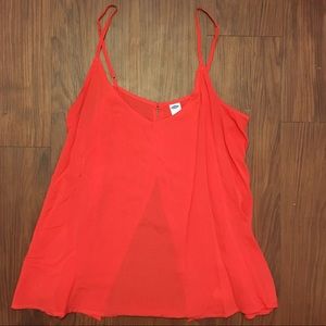 Bright red sleeveless top